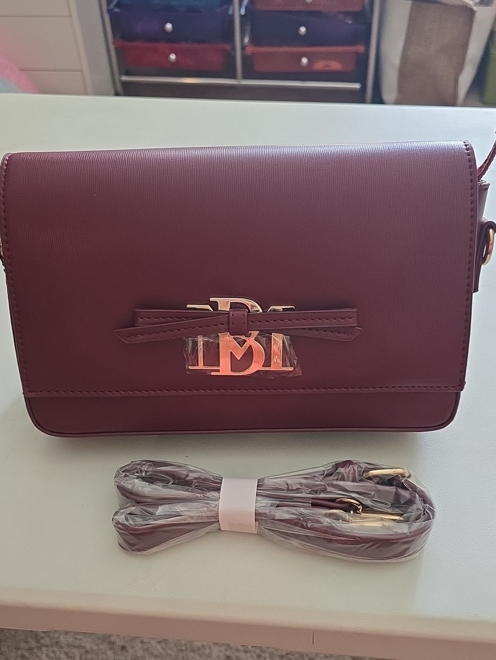 Badgley Mischka Wine Crossbody with Gold Logo Accent